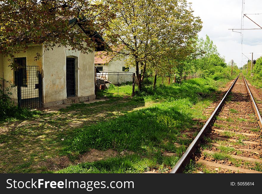 A view with an old train station in a village in Romania. A view with an old train station in a village in Romania