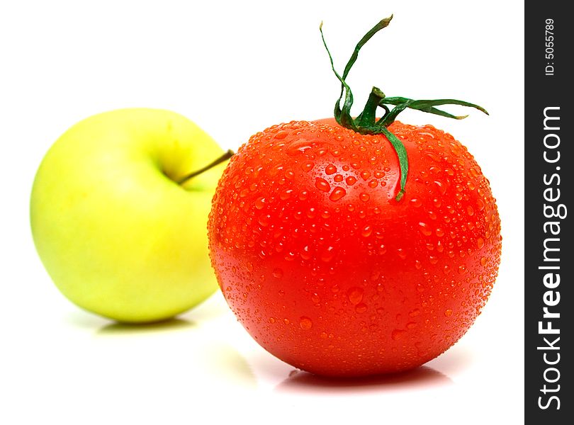 Yellow apple and tomato