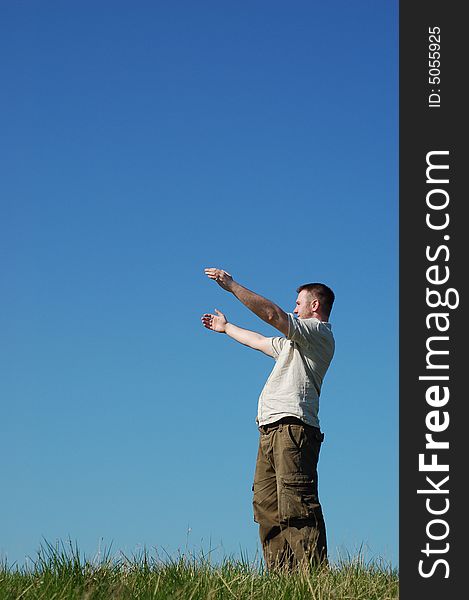 Happy man on sky background