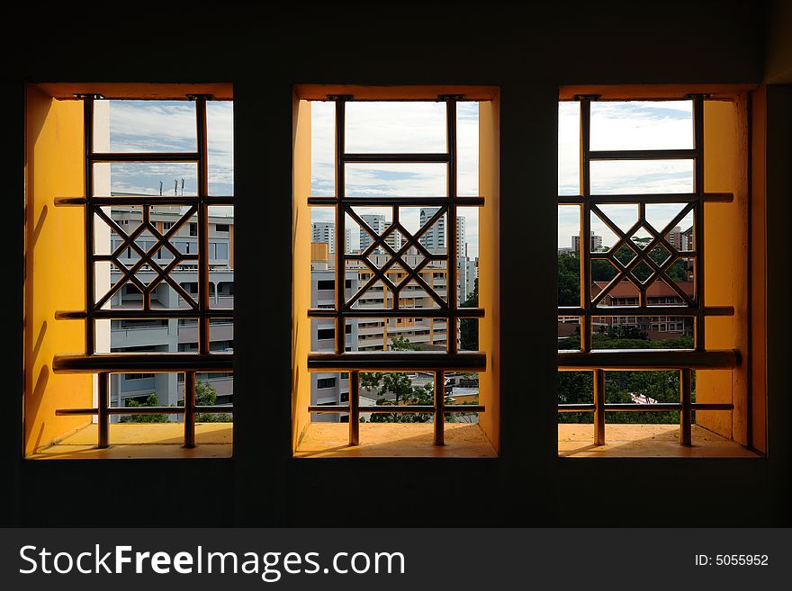 An outlook through the windos to the buildings beyond. An outlook through the windos to the buildings beyond