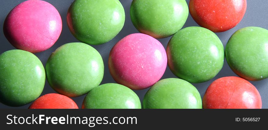 Colors candies on a background. Colors candies on a background