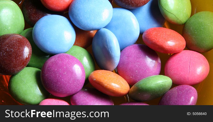 Colors candies on a background