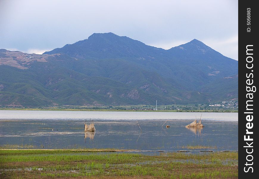 Quiet lake in lijiangï¼Œyunnan province