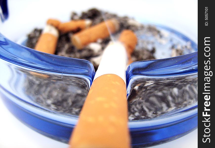 Cigarette on white background. Clear.