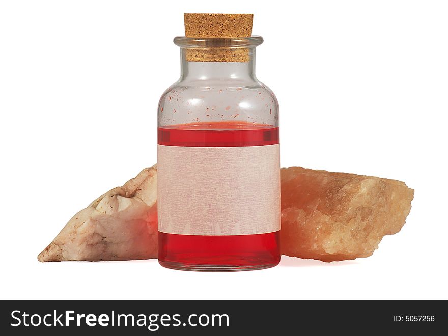 Red Liquid in Bottle with Blank Label and Two Stones - isolated on white background