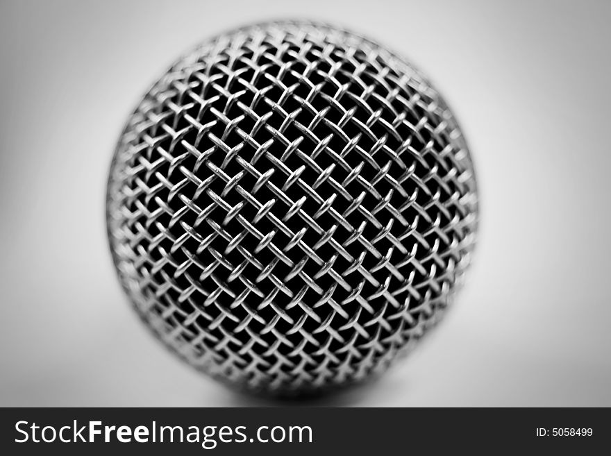 Photo of a microphone on a white background