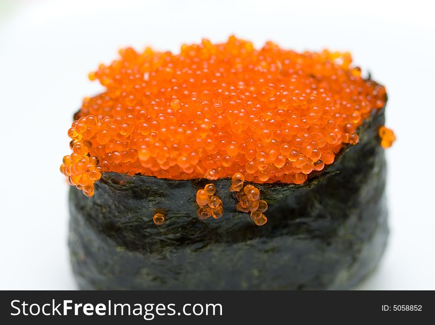 Sushi with red caviar macro