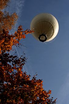 Looking Up At A White Hot Air Balloon In The Air Royalty Free Stock Photo