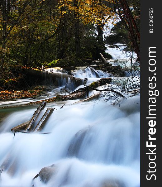 Waterfall in Jiuzaigou nature protection area, Sichuan province, South-West China. Waterfall in Jiuzaigou nature protection area, Sichuan province, South-West China.