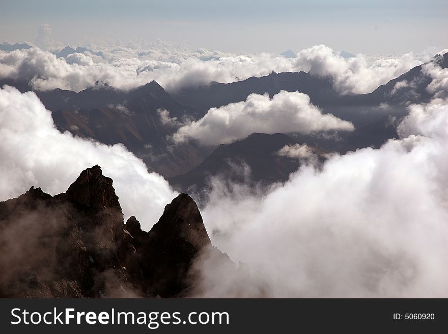 Cloud And Valleys In The Italian Alps