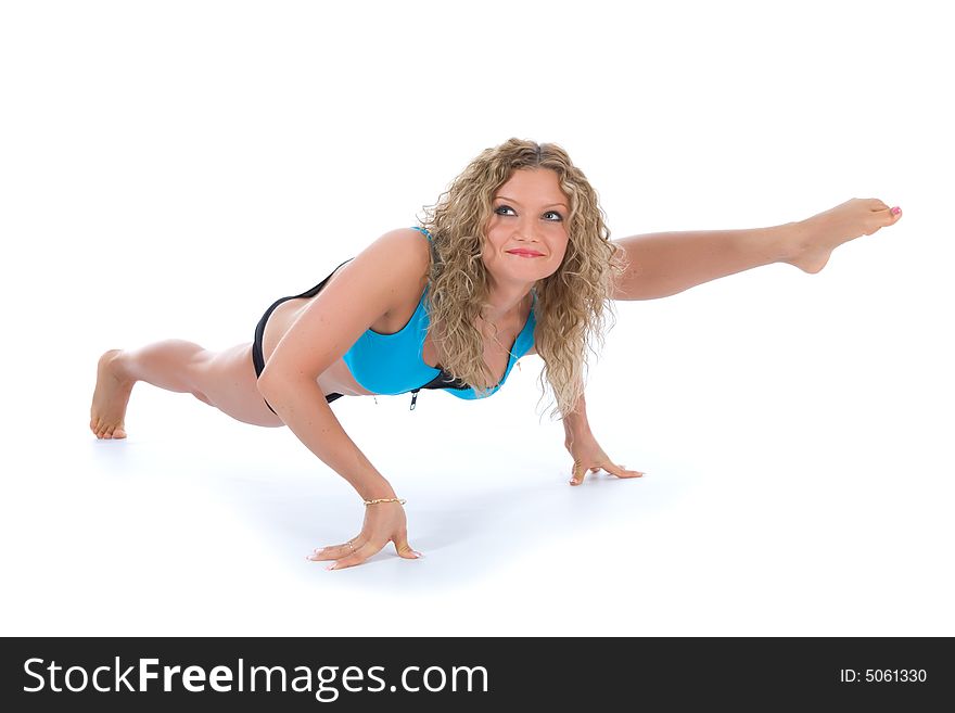 Girl practicing fitness  on  white  background