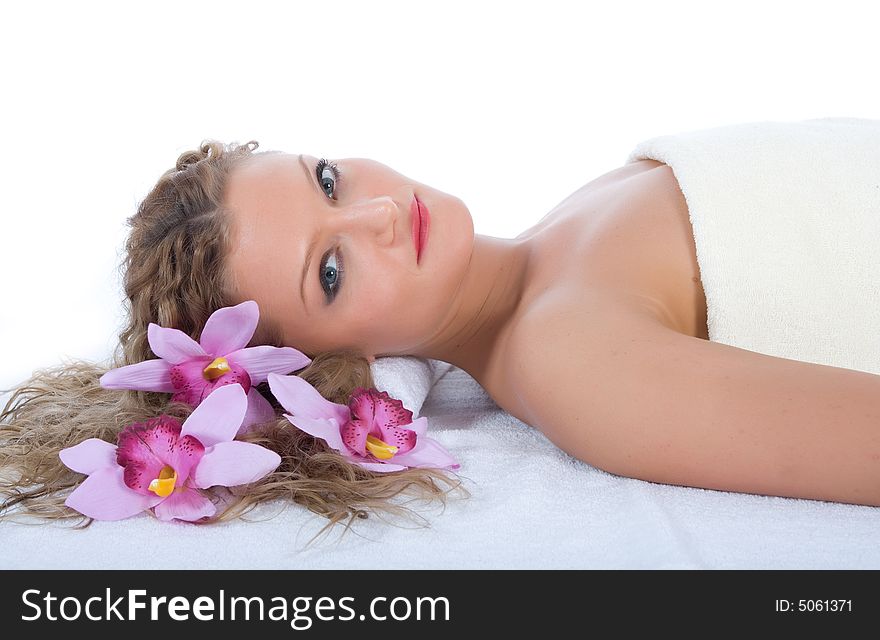 Attractive woman getting spa treatment on white