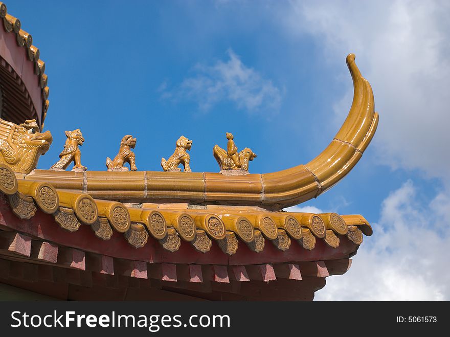 Asian style decorated roof close-up. Asian style decorated roof close-up