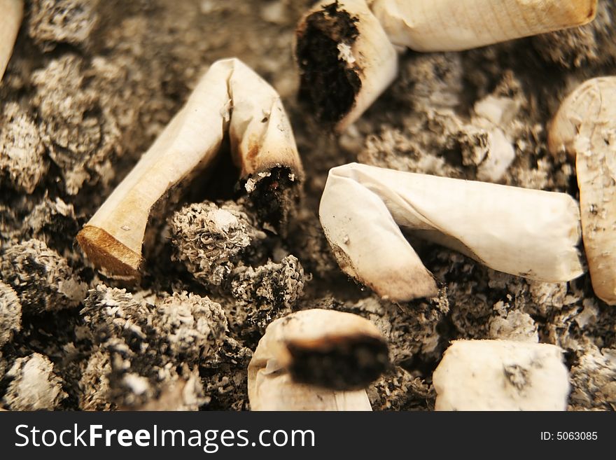 Close up of cigarettes in an ashtray