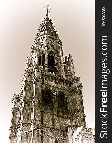 Toledo cathedral main tower from below, old styled.