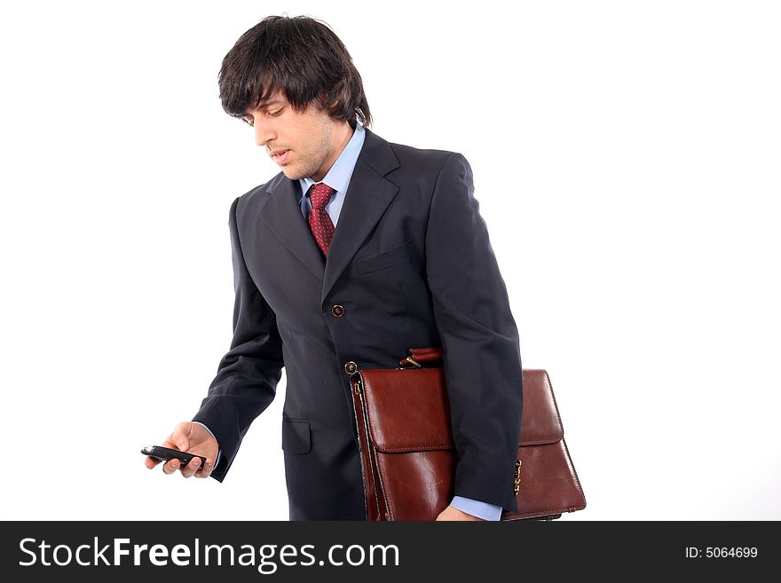 Businessman on the phone over a white background