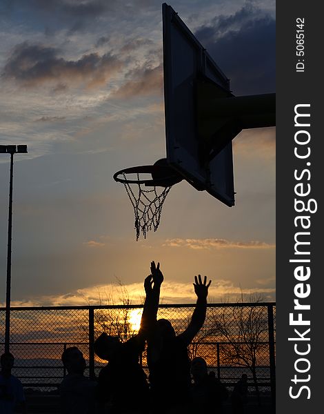 Basketball match at the sunset