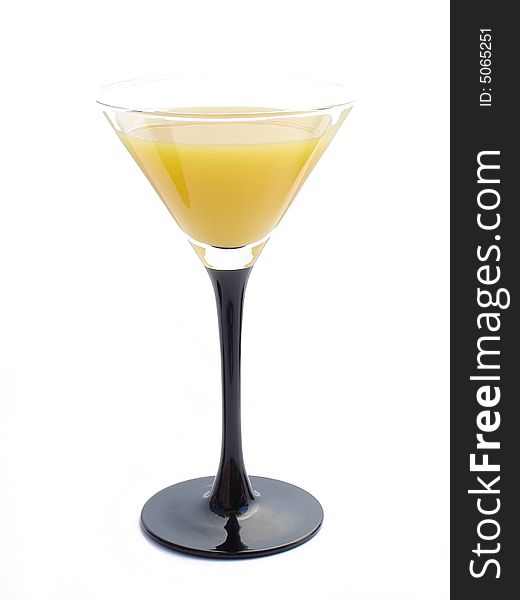 Orange juice in a martini glass.