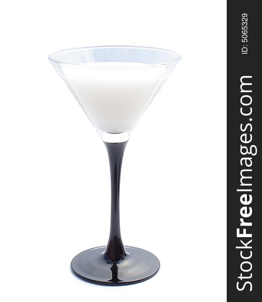 Coconut liqueur in a martini glass.