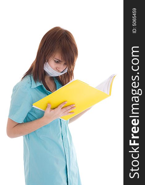 The young attractive nurse with a folder isolated