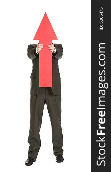 Businessman hiding behind red arrow over white background