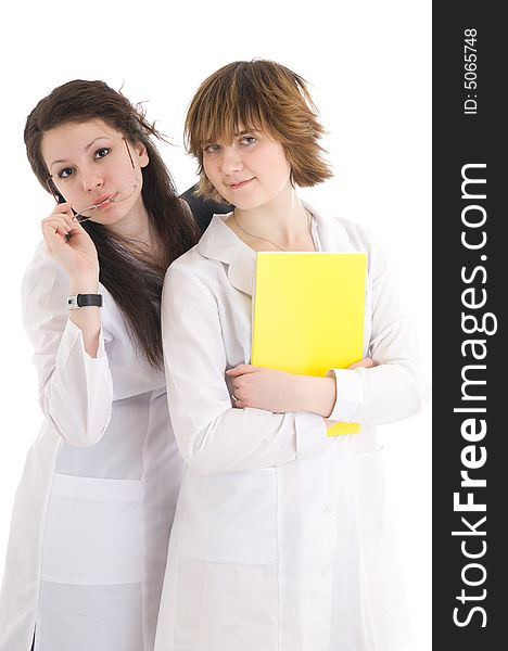 The young attractive nurse with a folder isolated on a white background. The young attractive nurse with a folder isolated on a white background