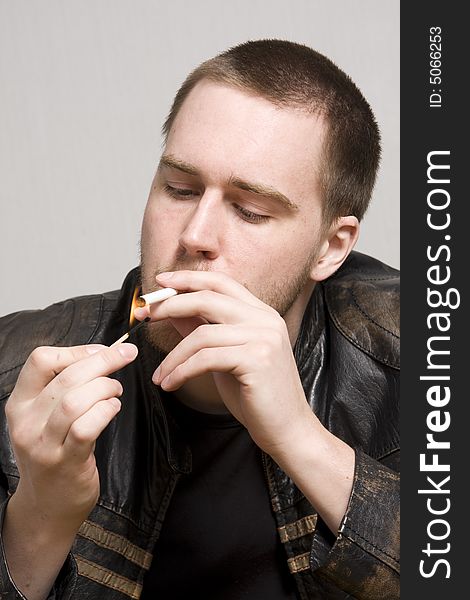 Man Smoking A Cigarette