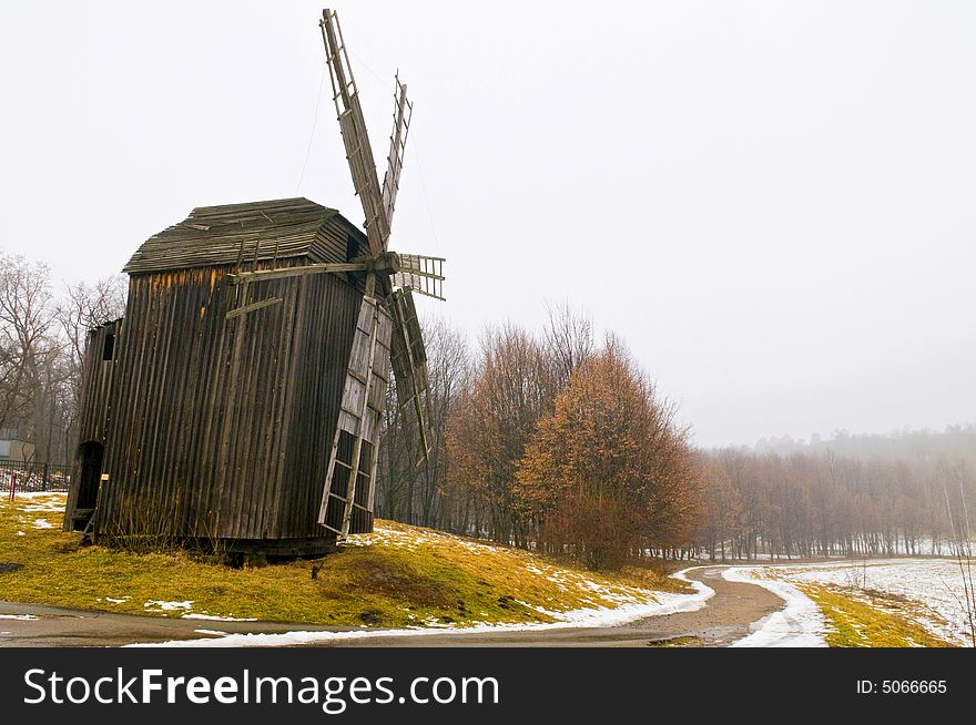 Windmill in ukranian village at winter time