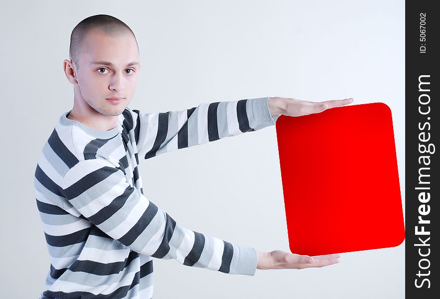 Man taking red square empty box at white background. Man taking red square empty box at white background