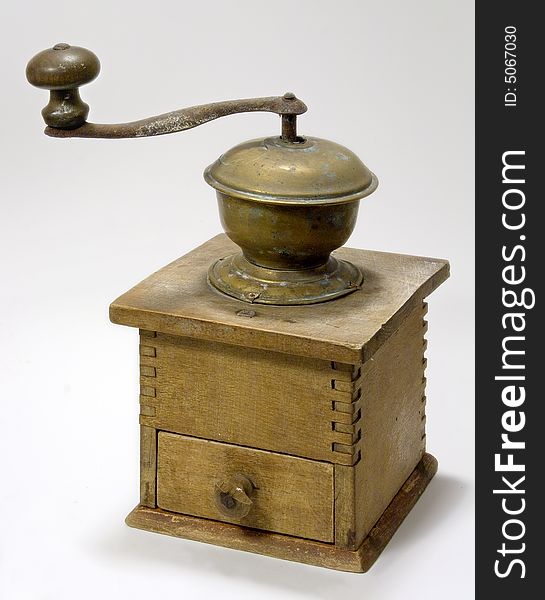 Old wooden coffee machine isolated. Old wooden coffee machine isolated