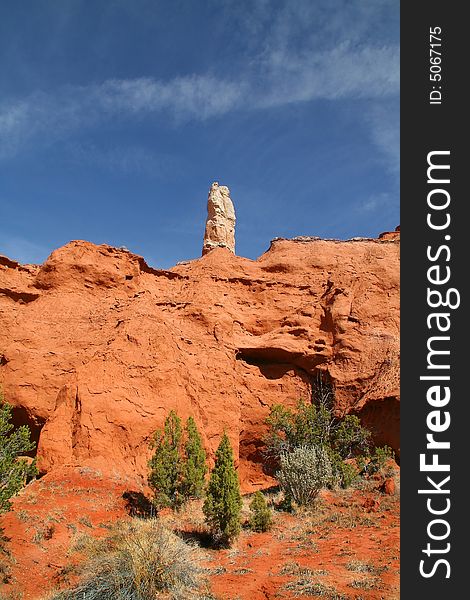 View of the red rock formations in Kodachrome Basin with blue skys and clouds. View of the red rock formations in Kodachrome Basin with blue skys and clouds