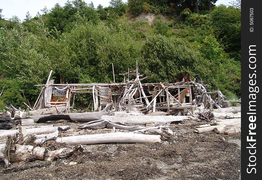 A beach house made of driftwood. A beach house made of driftwood.