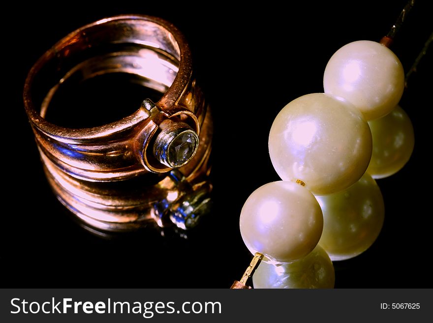 Gold Ring And Pearls