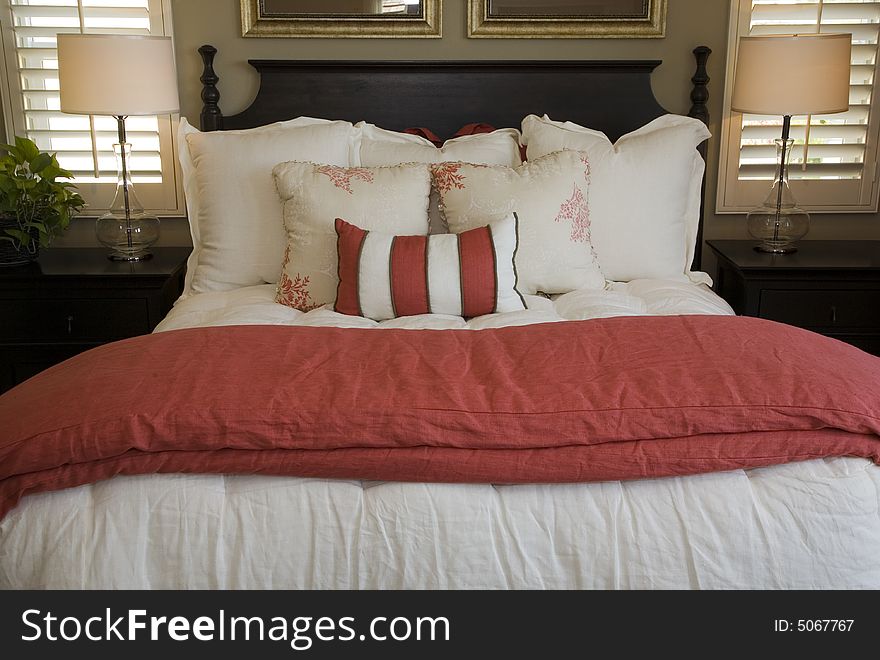Modern luxury bedroom with bright pillows. Modern luxury bedroom with bright pillows.
