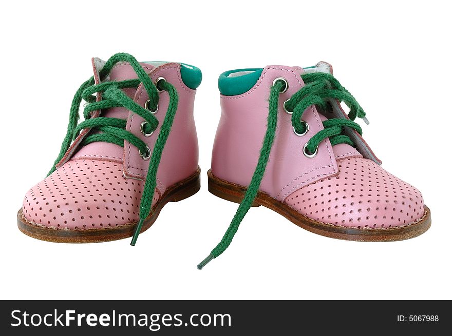 Pink leather baby's boots with green shoe-laces. Pink leather baby's boots with green shoe-laces.