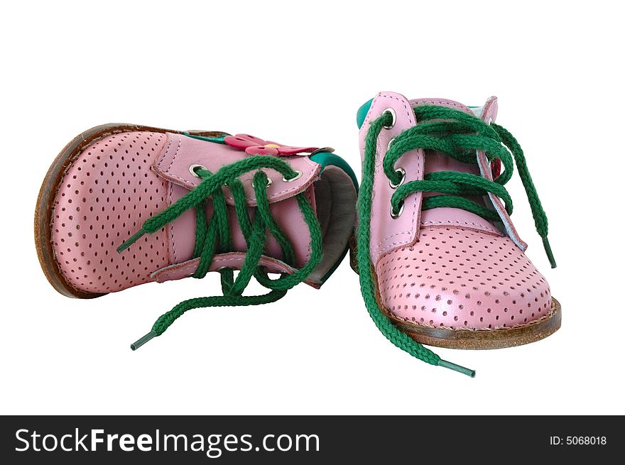 Pink leather baby's boots with green shoe-laces. Pink leather baby's boots with green shoe-laces.