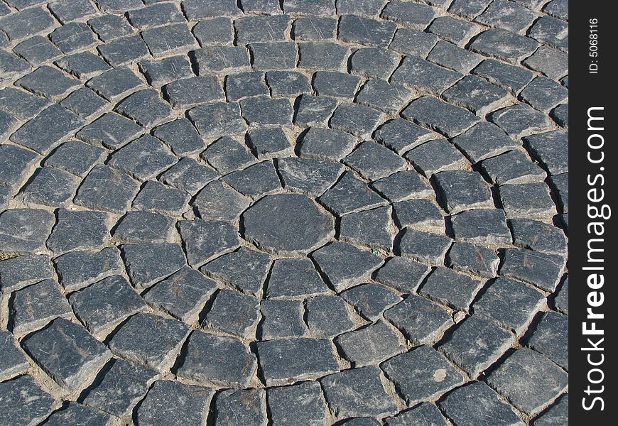 The circular ornament of the Palace (Dvortsovaya) square cobblestone road. The circular ornament of the Palace (Dvortsovaya) square cobblestone road.