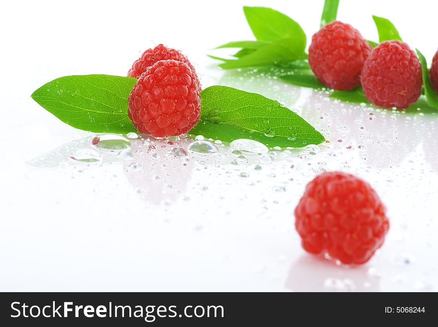 Delicious fresh raspberry on white background