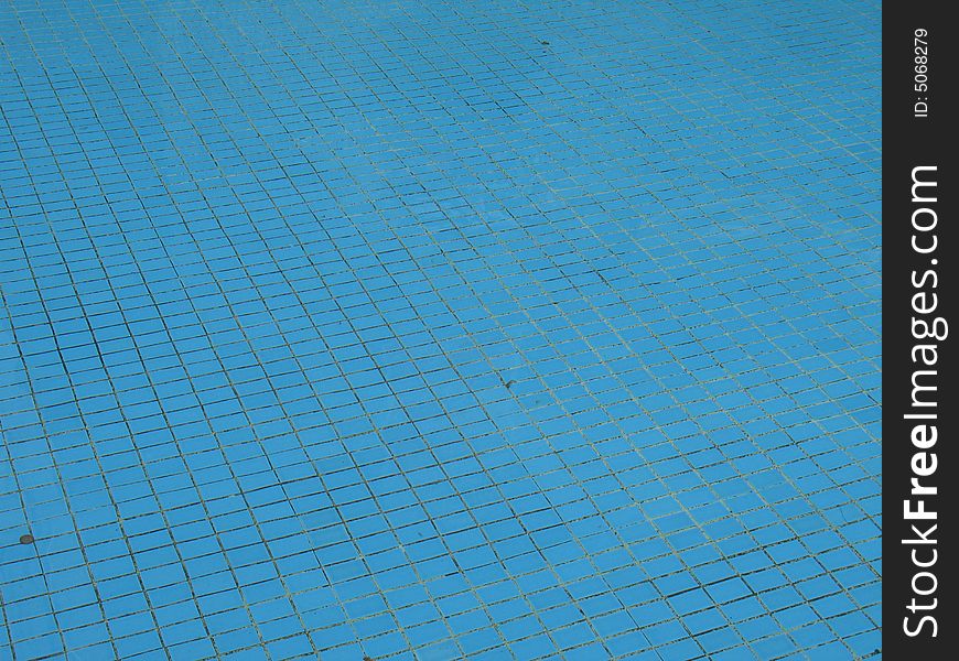 Blue pool with small tiles