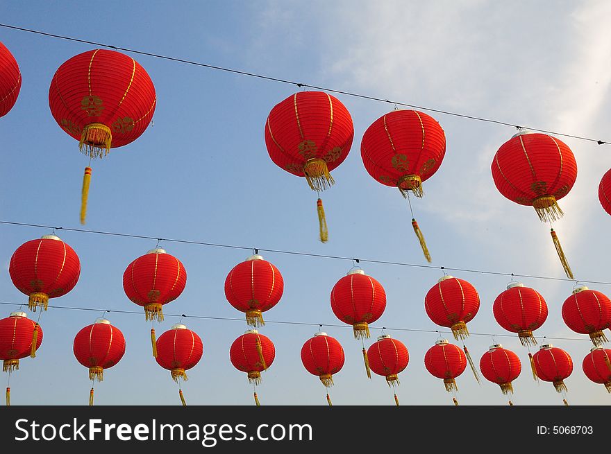 Red lanterns under the background of blue sky.