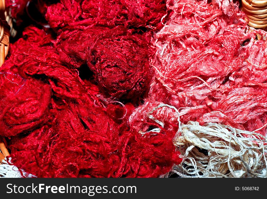Bunch of red and pink silk thread. Bunch of red and pink silk thread