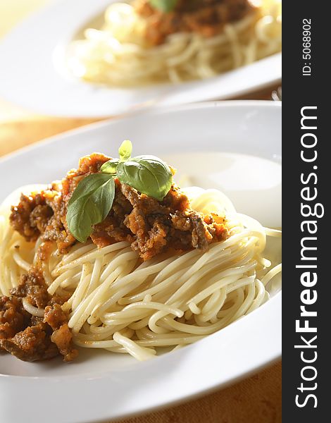 Plate with Spaghetti Bolognese studio shot