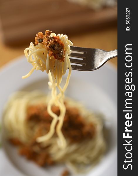 Plate with Spaghetti Bolognese studio shot