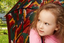 Little Girl And Umbrella Stock Images