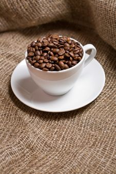 Cup With Freshly Roasted Coffee Beans On Sackcloth Stock Images Cup With Freshly Roasted Coffee Beans On Sackcloth Stock Images