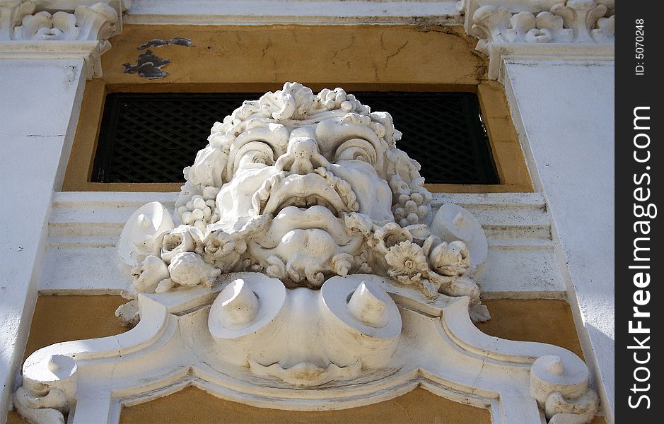A beautiful detailed sculpture above an entrance
