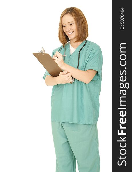 Isolated shot of caucasian nurse getting ready to write up report. Isolated shot of caucasian nurse getting ready to write up report