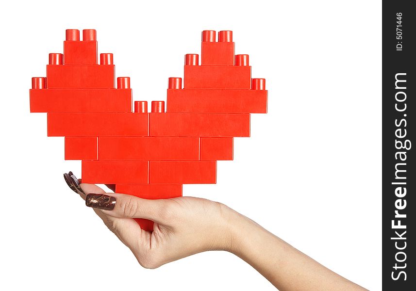 Woman hand holding red heart isolated over white background