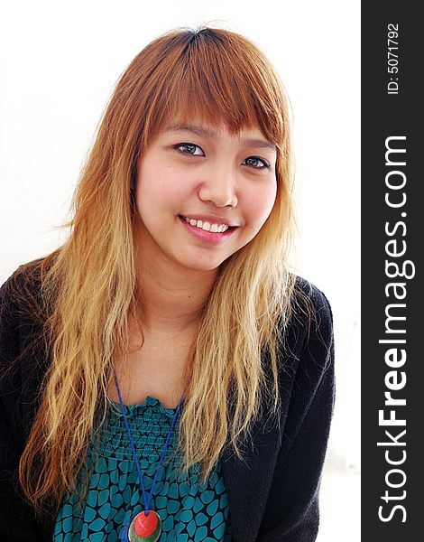 Portrait of a beautiful Thai girl with blond hair. Portrait of a beautiful Thai girl with blond hair.