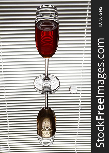 Red wine glass reflects like a white wine. Red wine glass reflects like a white wine